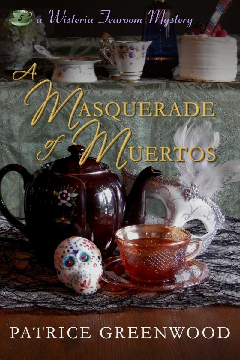 A Masquerade of Muertos (Wisteria Tearoom Mysteries Book 5)